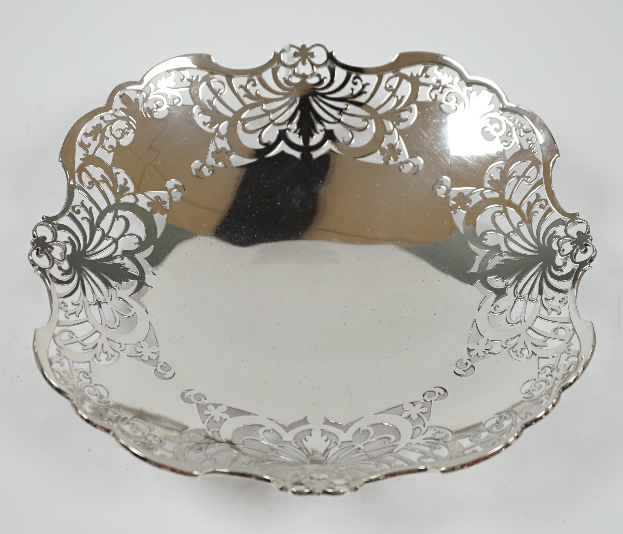 A George VI pierced silver shallow dish, by Collingwood & Sons Ltd, Sheffield, 1938, 23.3cm, 13.5 oz. Condition - fair